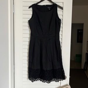 White house black market dress with lace hem.